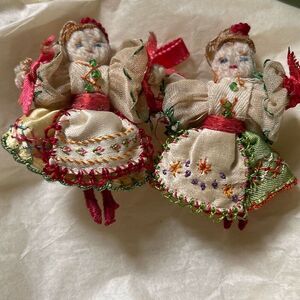 Vintage handmade Hungarian dolls beaded embroidered 2” in original costumes .